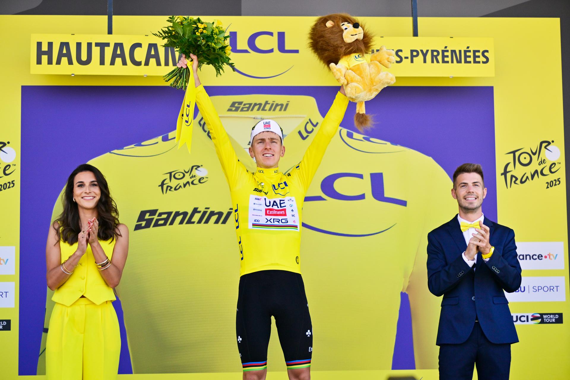 Slovenian Tadej Pogacar of UAE Team Emirates celebrates on the podium in the yellow jersey of leader in the overall ranking after stage 12 of the 2025 Tour de France cycling, from Auch to Hautacam (181 km), on Thursday 17 July 2025 in France. The 112th edition of the Tour de France starts on Saturday 5 July in Lille, France, and will finish in Paris, France on the 27th of July. BELGA PHOTO DIRK WAEM