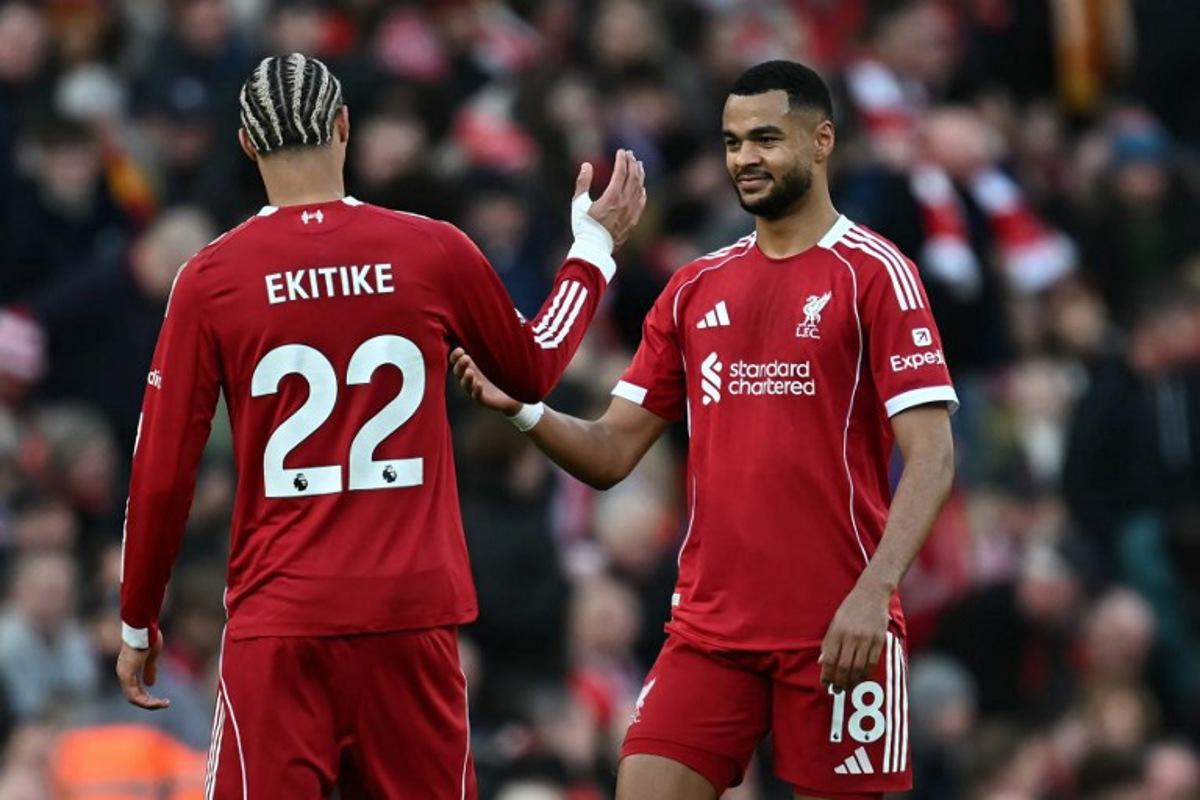 Liverpool's Dutch striker #18 Cody Gakpo (R) celebrates with Liverpool's French striker #22 Hugo Ekitike (L) after scoring their fourth goal during the English Premier League football match between Liverpool and West Ham United at Anfield in Liverpool, north west England on February 28, 2026. Paul ELLIS / AFP