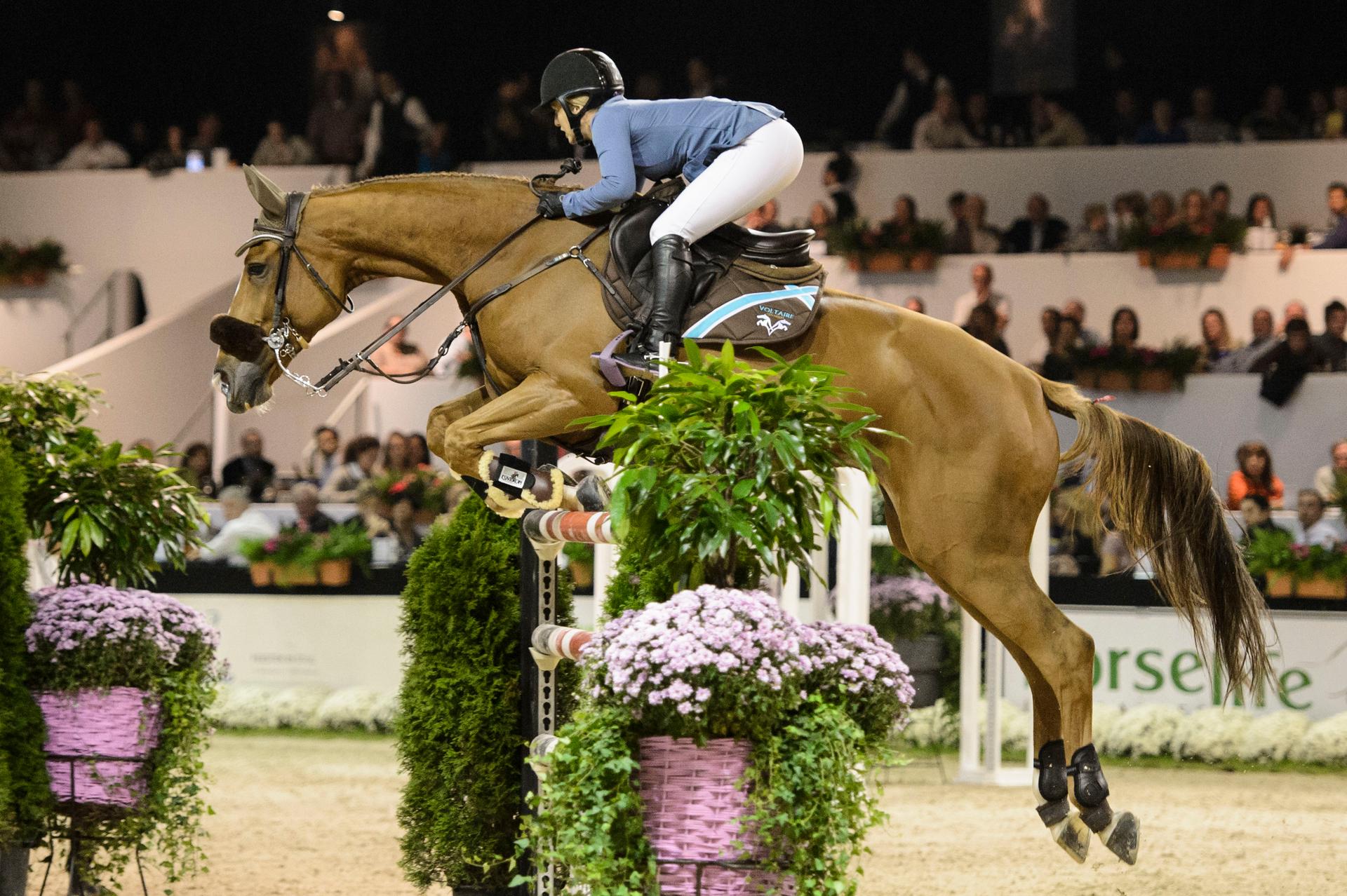 20141102 - LIEGE, BELGIUM: Ashlee Bond rides Chela LS during the 'Jumping International de Liege' equestrian event, in Liege, Sunday 02 November 2014. BELGA PHOTO NICOLAS LAMBERT