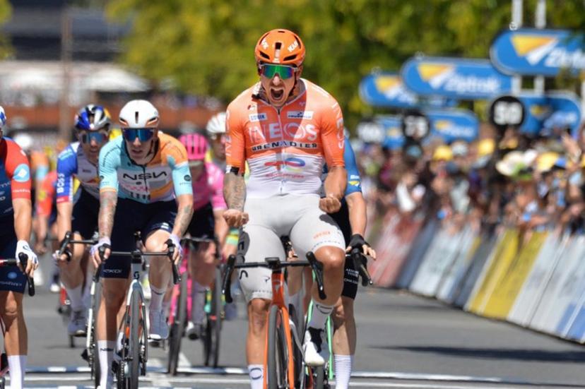 Ineos Grenadiers rider Sam Welsford from Australia celebrates winning stage three of the Tour Down Under UCI Men's Cycling race in Adelaide on January 23, 2026. Brenton Edwards / AFP