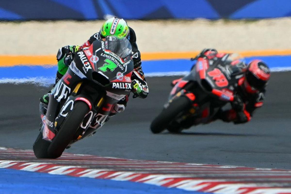 Fantic Racing Lino Sonego team's Belgian Moto2 rider Barry Baltus (L) competes during the Moto2 race as part of the San Marino Moto GP at the Misano World Circuit Marco Simoncelli, in Misano Adriatico, northern Italy, on September 14, 2025. Andreas SOLARO / AFP