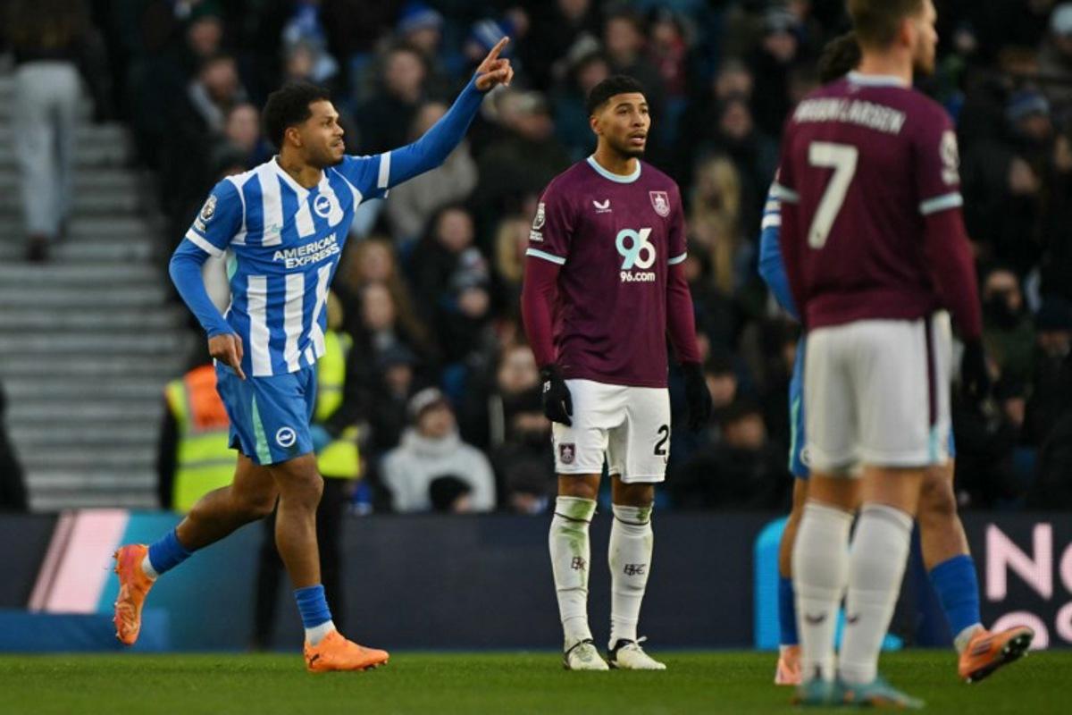 Brighton's French midfielder #10 Georginio Rutter celebrates scoring the opening goal to take the lead 1-0 during the English Premier League football match between Brighton and Hove Albion and Burnley at the American Express Community Stadium in Brighton, southern England on January 3, 2026. Glyn KIRK / AFP