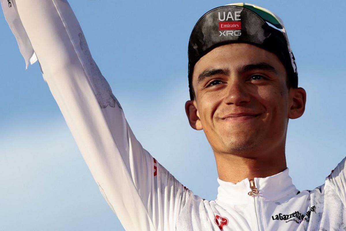 UAE Team Emirates XRG's Mexican rider Isaac Del Toro wearing the best young rider's white jersey (Maglia Bianca) celebrates on the podium at the end of the 21st and last stage of the 108th Giro d'Italia cycling race of 143kms from Rome to Rome on June 1, 2025. Luca Bettini / AFP
