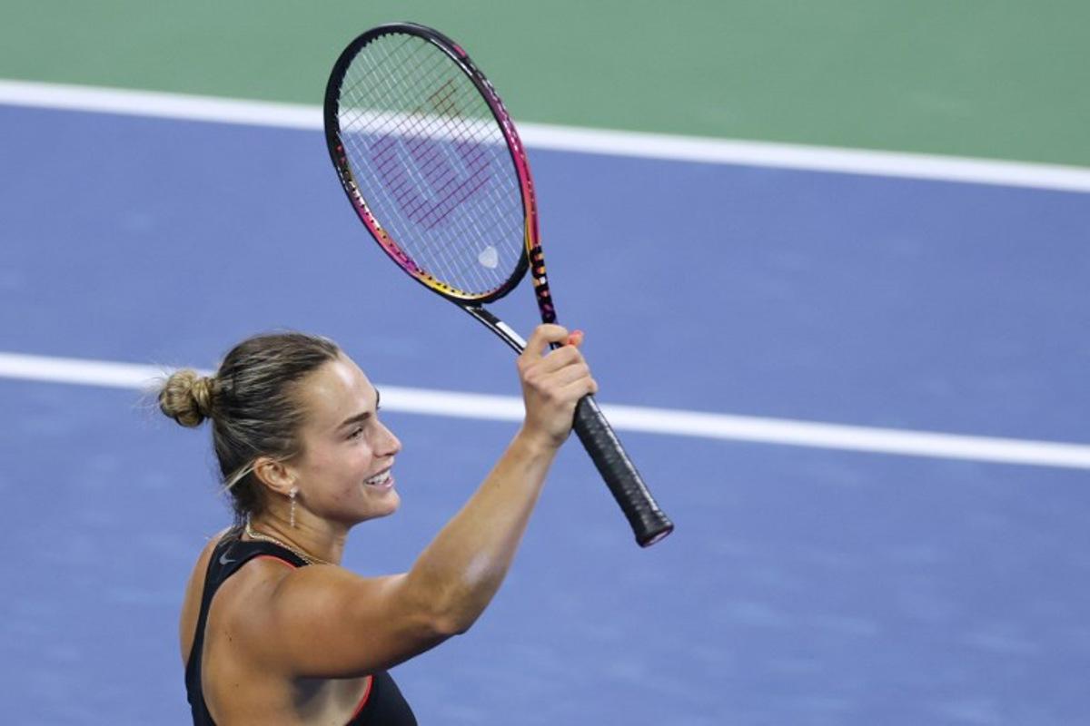 Belarus's Aryna Sabalenka celebrates after winning her women's singles third round tennis match against Canada's Leylah Fernandez on day six of the US Open tennis tournament at the USTA Billie Jean King National Tennis Center in New York City, on August 29, 2025. CHARLY TRIBALLEAU / AFP