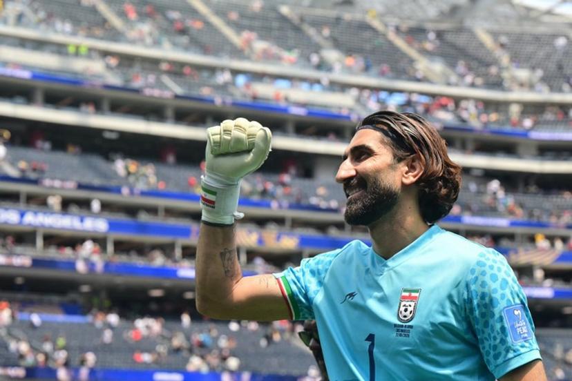 Iran's goalkeeper #01 Alireza Beiranvand celebrates at the end of the 2026 World Cup Group G football match between Belgium and Iran at the Los Angeles Stadium in Inglewood on June 21, 2026. Frederic J. Brown / AFP