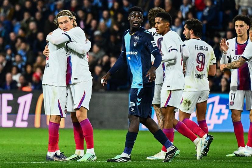 PSG's Belgian forward #22 Mika Godts (2L) celebrates scoring his team's first goal during the French L1 football match between Le Havre Athletic Club and Paris Saint-Germain (PSG) at Stade Oceane in Le Havre, north-western France on October 30, 2026. Guillaume SALIGOT / AFP