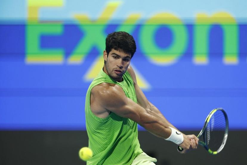 Spain's Carlos Alcaraz hits a return against Russia's Karen Khachanov during their men's singles quarterfinal match at the Qatar Open tennis tournament in Doha on February 19, 2026. Karim JAAFAR / AFP