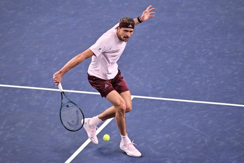 Germany's Alexander Zverev hits a return to Australia's Alex de Minaur during their men's singles quarter-final match at the Shanghai Masters tennis tournament in Shanghai on October 15, 2026. Hector RETAMAL / AFP
