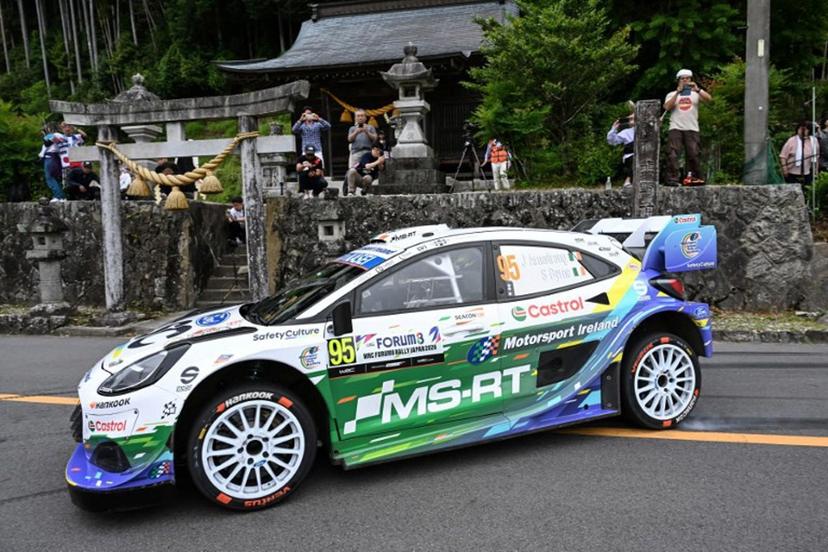 Jon Armstrong of Ireland and his co-driver Shane Byrne of Ireland drive their Ford Puma Rally1 during the SS16 Lake Mikawako section of the Rally Japan, the 7th round of FIA World Rally Championships, in Toyota city, Aichi prefecture on May 31, 2026. Toshifumi KITAMURA / AFP