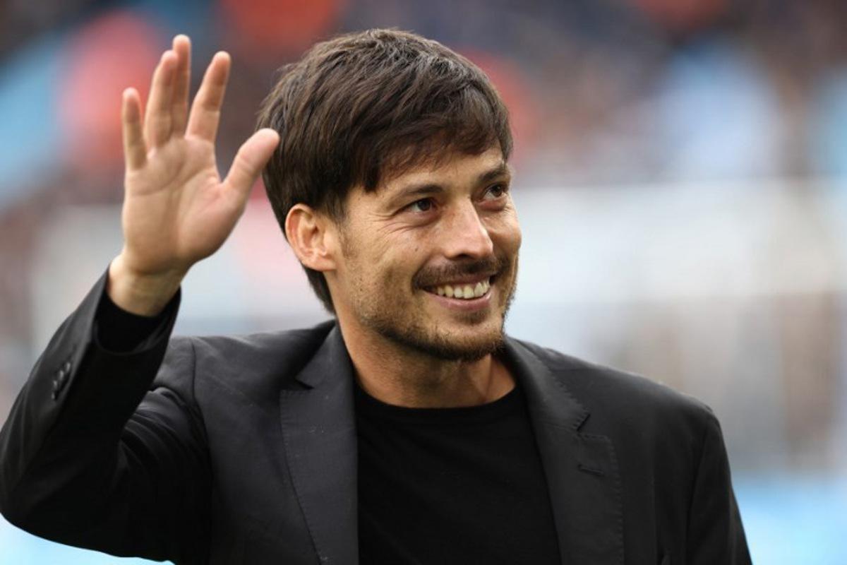 Former City player David Silva is introduced ahead of kick-off in the English Premier League football match between Manchester City and Wolverhampton Wanderers at the Etihad Stadium in Manchester, north west England, on May 4, 2024. Darren Staples / AFP