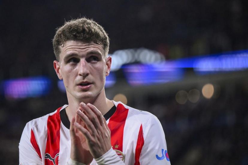 PSV Eindhoven's Dutch midfielder #20 Guus Til reacts during the UEFA Champions League, league phase day 6, football match between PSV Eindhoven (NED) and Atletico Madrid (ESP), at the Philips Stadion, in Eindhoven, south of The Netherlands, on December 9, 2025. JOHN THYS / AFP
