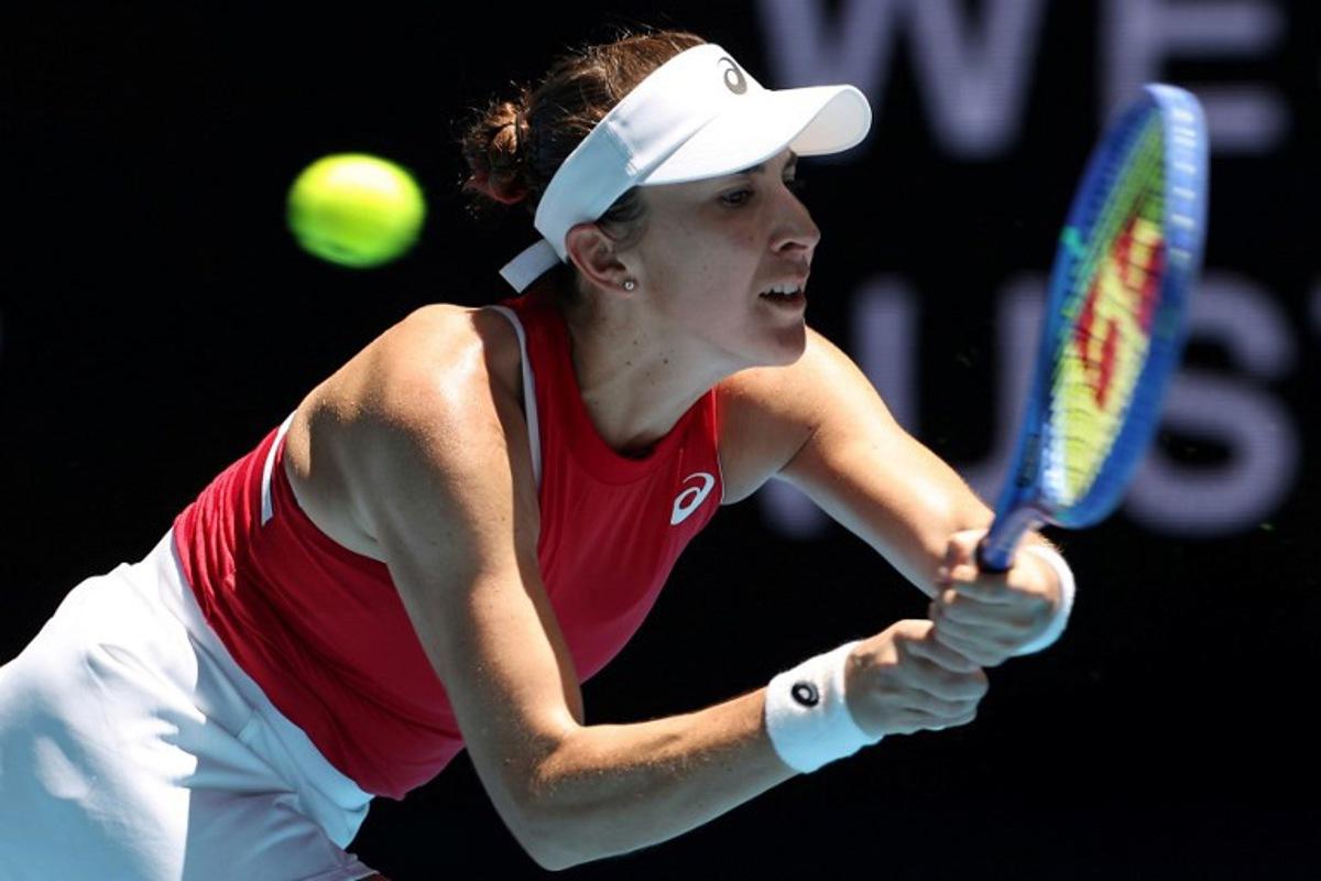 Switzerland's Belinda Bencic hits a return to France's Lois Boisson during their women's singles match at the United Cup tennis tournament in Perth on January 3, 2026. COLIN MURTY / AFP