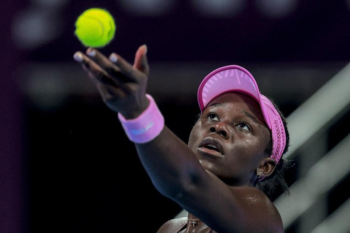 Canada's Victoria Mboko serves to Czech Republic's Karolina Muchova during their women's singles final match at the Qatar Open tennis tournament in Doha on February 14, 2026. Karim JAAFAR / AFP