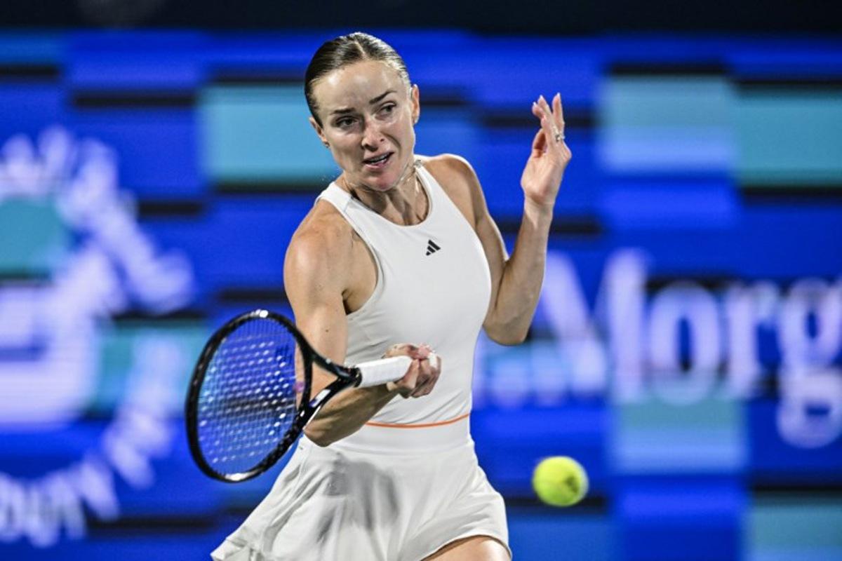 Ukraine's Elina Svitolina hits a return to US' Jessica Pegula during their women's singles final match at the Dubai Duty Free Tennis tournament in Dubai on February 21, 2026. Ryan Lim / AFP