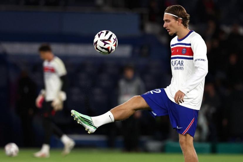 PSG's Belgian forward #22 Mika Godts controls the ball during the warm up ahead of the French L1 football match between Paris Saint-Germain (PSG) and Le Mans FC at the Parc des Princes stadium in Paris on October 10, 2026. FRANCK FIFE / AFP