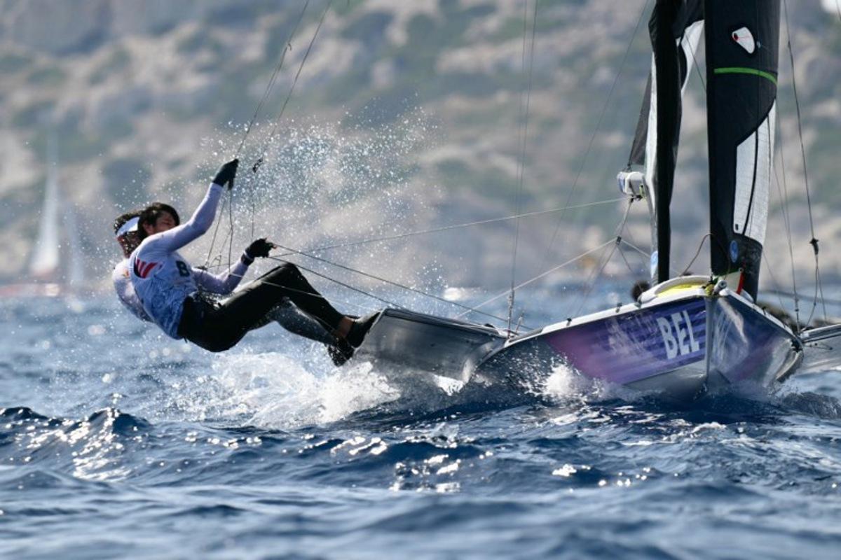 Belgium's duo Yannick Lefebvre and Jan Heuninck compete in race 10 of the men's 49er skiff event during the Paris 2024 Olympic Games sailing competition at the Roucas-Blanc Marina in Marseille on July 31, 2024. Christophe SIMON / AFP