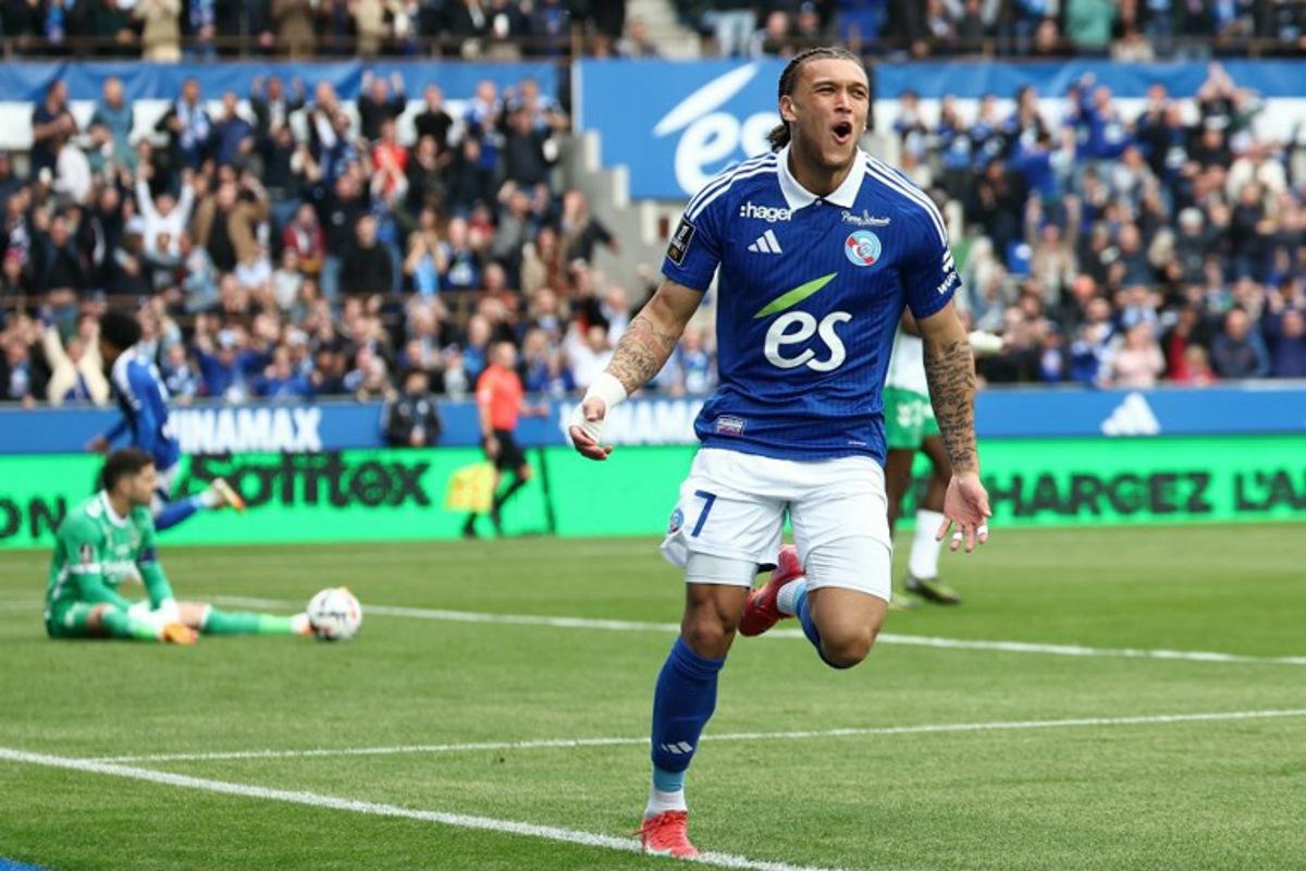 Strasbourg's Belgian-Portuguese forward #07 Diego Moreira celebrates after scoring a goal during the French L1 football match between RC Strasbourg Alsace and AS Saint-Etienne at Stade de la Meinau in Strasbourg, north-eastern France on April 26, 2025. Frederick FLORIN / AFP