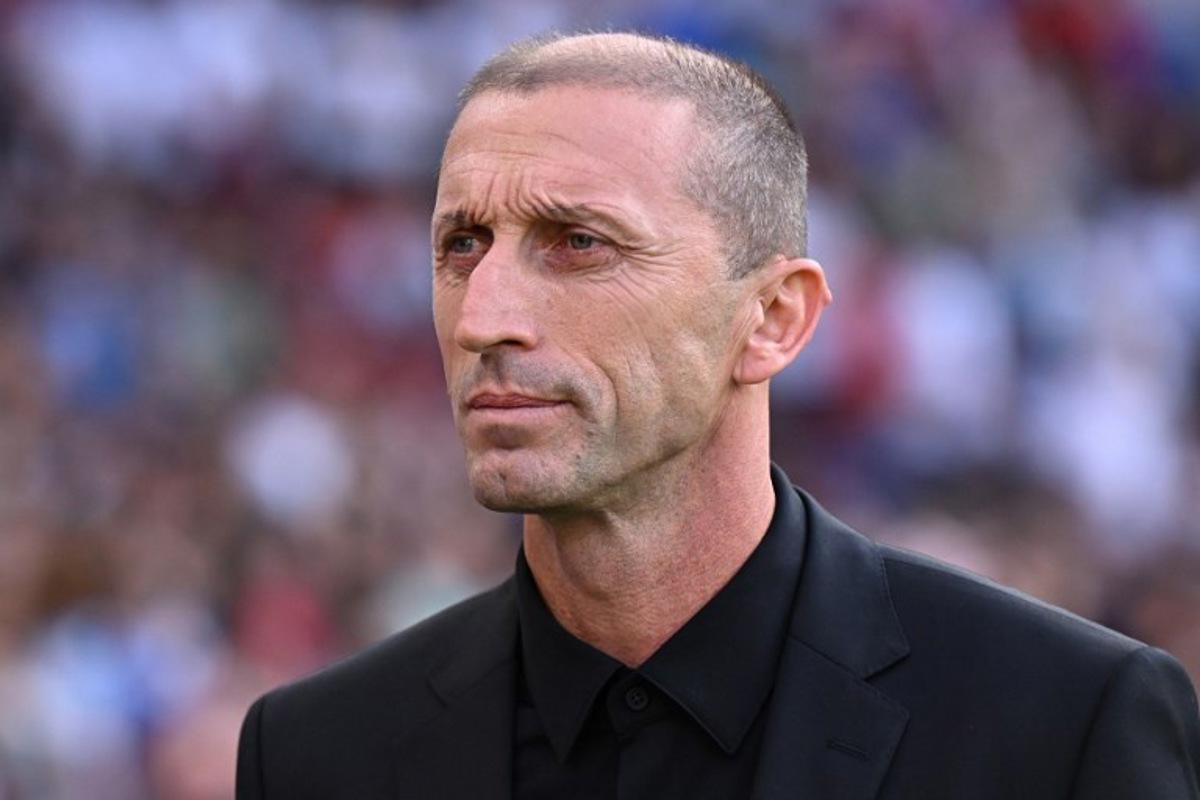North Macedonia's coach Blagoja Milevski arrives ahead of the UEFA Euro 2024 group C qualification football match between England and North Macedonia at Old Trafford in Manchester, north west England, on June 19, 2023. Oli SCARFF / AFP