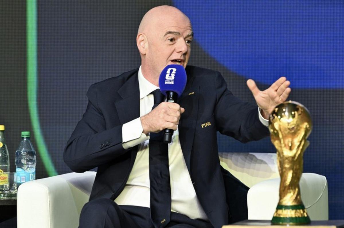 FIFA President Gianni Infantino speaks during the FIFA World Cup 2026 official match schedule announcement in Washington, DC, on December 6, 2025. Roberto SCHMIDT / AFP