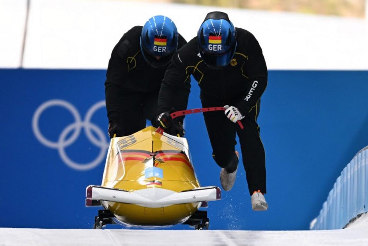 Germany's Francesco Friedrich takes part in the 2-man bobsleigh training at the Yanqing National Sliding Centre during the Beijing 2022 Winter Olympic Games in Yanqing on February 12, 2022. Daniel MIHAILESCU / AFP