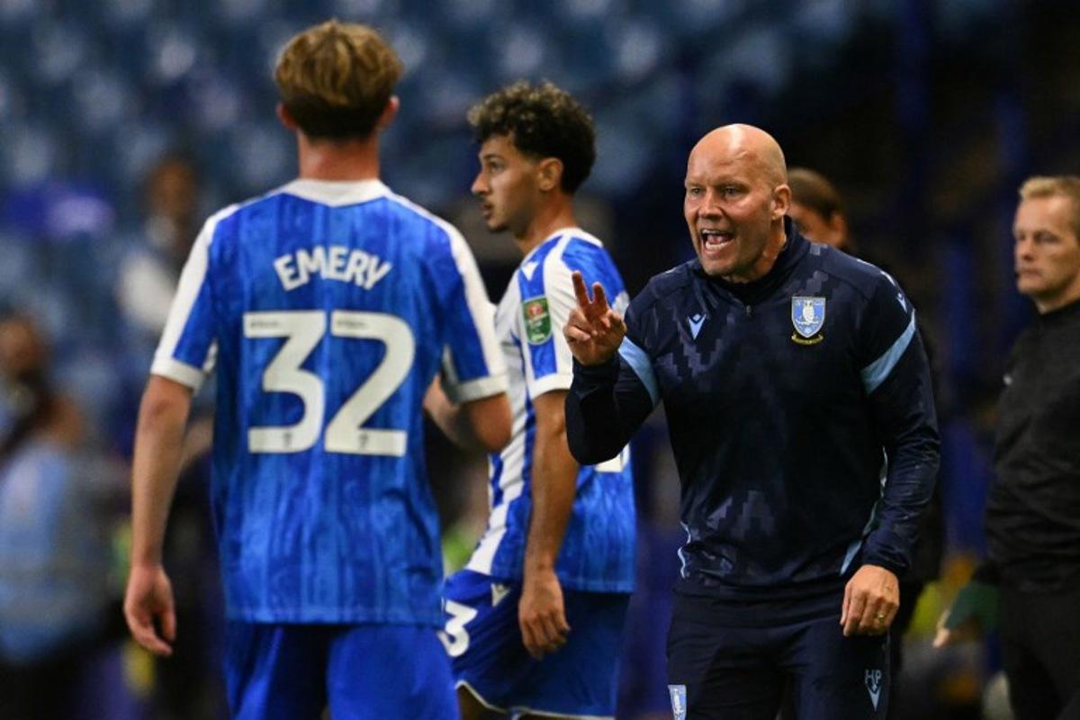 Sheffield Wednesday's Danish manager Henrik Pedersen gestures on the touchline during the English League Cup second round football match between Sheffield Wednesday and Leeds United at The Hillsborough Stadium in Sheffield, northern England on August 26, 2025. Oli SCARFF / AFP
