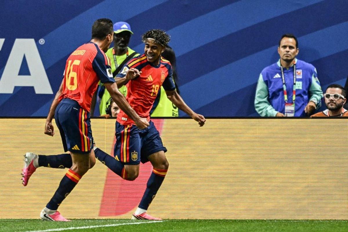 Spain's forward #19 Lamine Yamal (R) celebrates after scoring the opening goal during the 2026 World Cup Group H football match between Spain and Saudi Arabia at the Atlanta Stadium in Atlanta on June 21, 2026. ROBERTO SCHMIDT / AFP