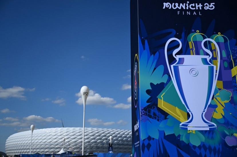 A placard is seen outside the Allianz Arena Stadium on the eve of the UEFA Champions League final football match between Inter Milan and Paris Saint-Germain (PSG) in Munich, southern Germany on May 30, 2025. Kirill KUDRYAVTSEV / AFP