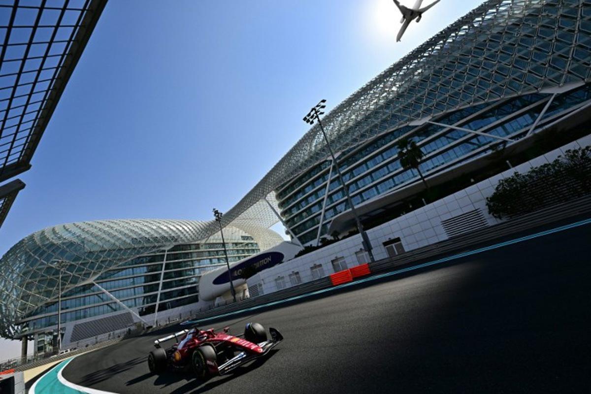 Ferrari's Monaco driver Charles Leclerc drives during the Pirelli test session at the Yas Marina Circuit in Abu Dhabi on December 9, 2025. Giuseppe CACACE / AFP