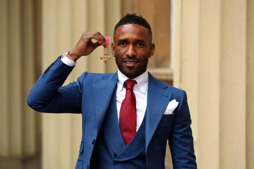 England and Bournemouth footballer Jermain Defoe poses with his medal after he was appointed Officer of the Order of the British Empire (OBE) at an investiture ceremony at Buckingham Palace, London on November 16, 2018, for services to the Jermain Defoe Foundation. Jonathan Brady / POOL / AFP