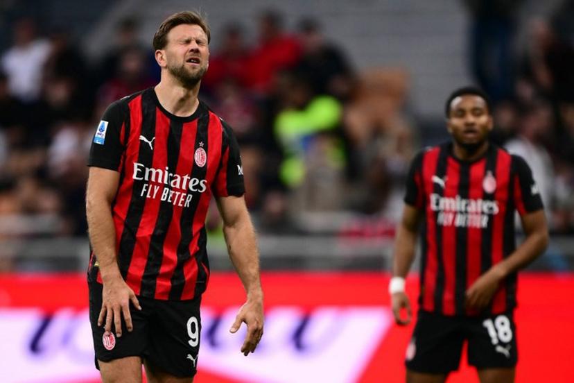 AC Milan's German forward #09 Niclas Fullkrug reacts during the Italian Serie A football match between AC Milan and Udinese at the San Siro Stadium in Milan, northern Italy, on April 11, 2026. MARCO BERTORELLO / AFP