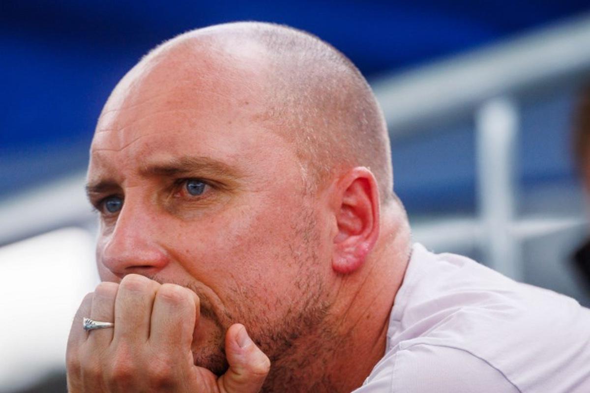 Belgium's Steve Darcis, coach of Raphael Collignon, attends the men's singles match against Canada's Denis Shapovalov at the Brisbane International tennis tournament in Patrick Rafter Tennis Centre in Brisbane on January 6, 2026. Patrick HAMILTON / AFP PHOTO / AFP