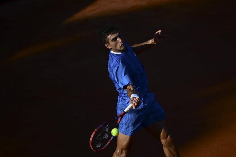Argentina's Roman Andres Burruchaga returns the ball to Argentina's Sebastian Baez during the ATP 500 Rio Open in Rio de Janeiro, Brazil, on February 18, 2025. Mauro PIMENTEL / AFP