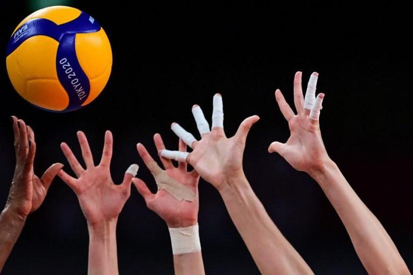 This picture shows the hand of Brazil's Fernanda Rodrigues (L) hitting the ball in the women's quarter-final volleyball match between Brazil and Russia during the Tokyo 2020 Olympic Games at Ariake Arena in Tokyo on August 4, 2021. PEDRO PARDO / AFP