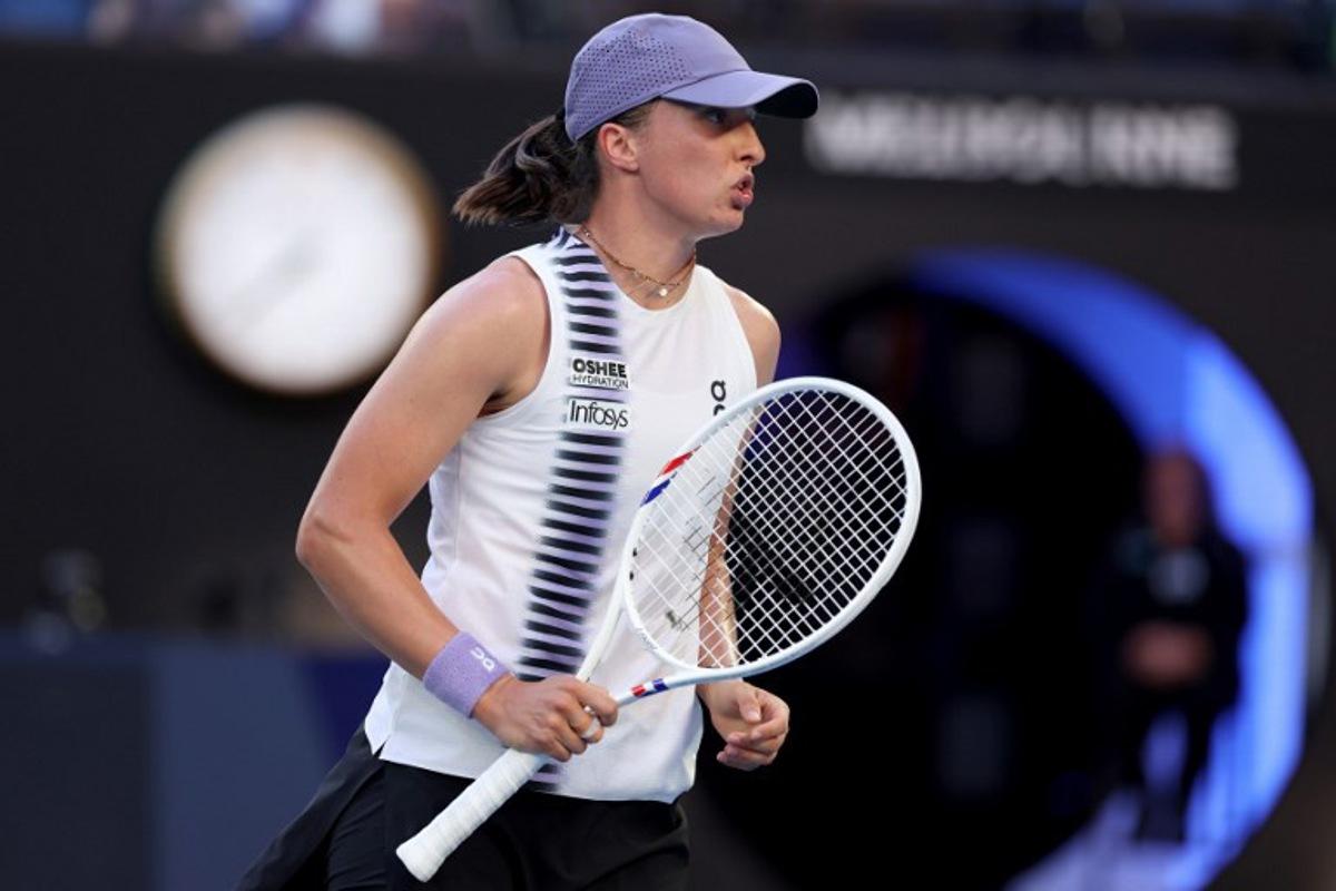 Poland's Iga Swiatek reacts on a point to Australia's Maddison Inglis during their women's singles match on day nine of the Australian Open tennis tournament in Melbourne on January 26, 2026. Martin KEEP / AFP