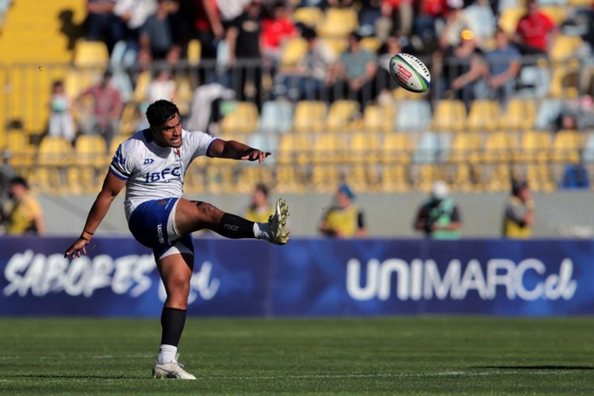 Samoa's fly half #10 Martini Talapusi kicks the ball during the Rugby World Cup Qualifying 2025 match between Chile and Samoa at the Sausalito Stadium in Vina del Mar, Chile, on September 27, 2025. Javier TORRES / AFP