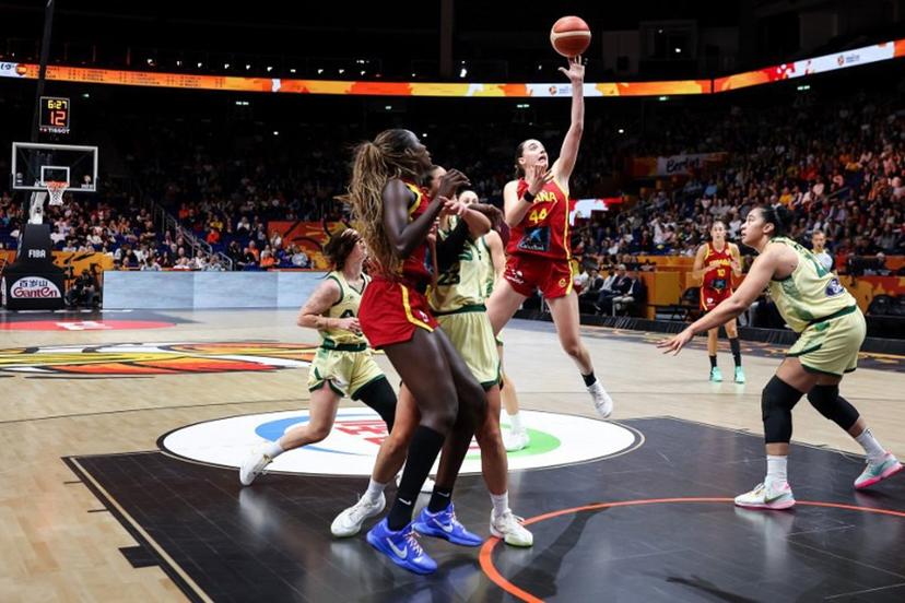 Australia's center #22 Zitina Aokuso (R) and Spain's point guard #44 Iyana Martin (C) vie for the ball during the 2026 FIBA Women's Basketball World Cup quarter-final match between Australia and Spain at the Berlin Arena in Berlin on September 10, 2026. Ronny HARTMANN / AFP