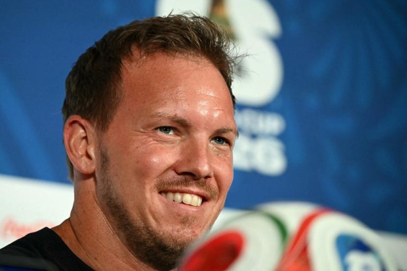 Germany's head coach Julian Nagelsmann smiles during a press conference at the Houston Stadium in Houston on June 13, 2026, on the eve of the 2026 World Cup football match between Germany and Curacao. RONALDO SCHEMIDT / AFP