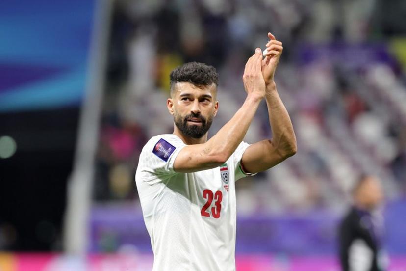 Iran's defender #23 Ramin Rezaeian reacts after the Qatar 2023 AFC Asian Cup Group C football match between Hong Kong and Iran at the Khalifa International Stadium in Doha on January 19, 2024. Giuseppe CACACE / AFP