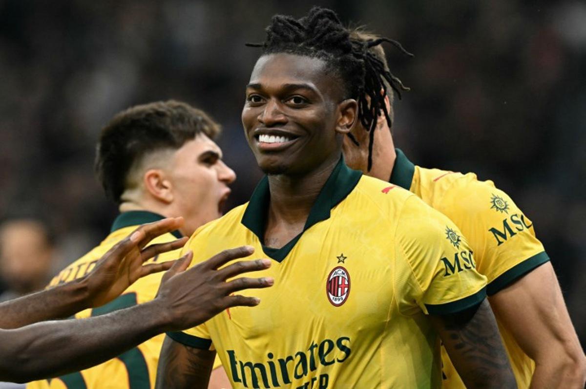 AC Milan's Portuguese forward #10 Rafael Leao celebrates scoring his team's second goal during the Italian Serie A football match between AC Milan and Fiorentina at San Siro stadium in Milan, northern Italy, on October 19, 2025. Stefano RELLANDINI / AFP