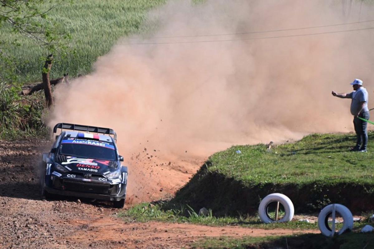 French driver Sebastien Ogier and co-driver Vincent Landais compete in their Toyota GR Yaris Rally1 compete in their Toyota GR Yaris Rally1 during the Artigas stage of the WRC Rally Paraguay, the 10th round of the FIA World Rally Championship (WRC), in General Artigas near Encarnacion, Paraguay on August 30, 2025. Luis ROBAYO / AFP