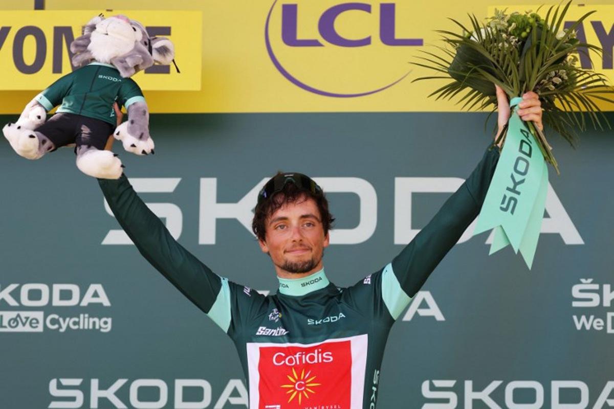 Cofidis' French rider Victor Lafay celebrates on the podium with the best sprinter's green jersey after the 3rd stage of the 110th edition of the Tour de France cycling race, 193,5 km between Amorebieta-Etxano in Northern Spain and Bayonne in southwestern France, on July 3, 2023. Thomas SAMSON / AFP