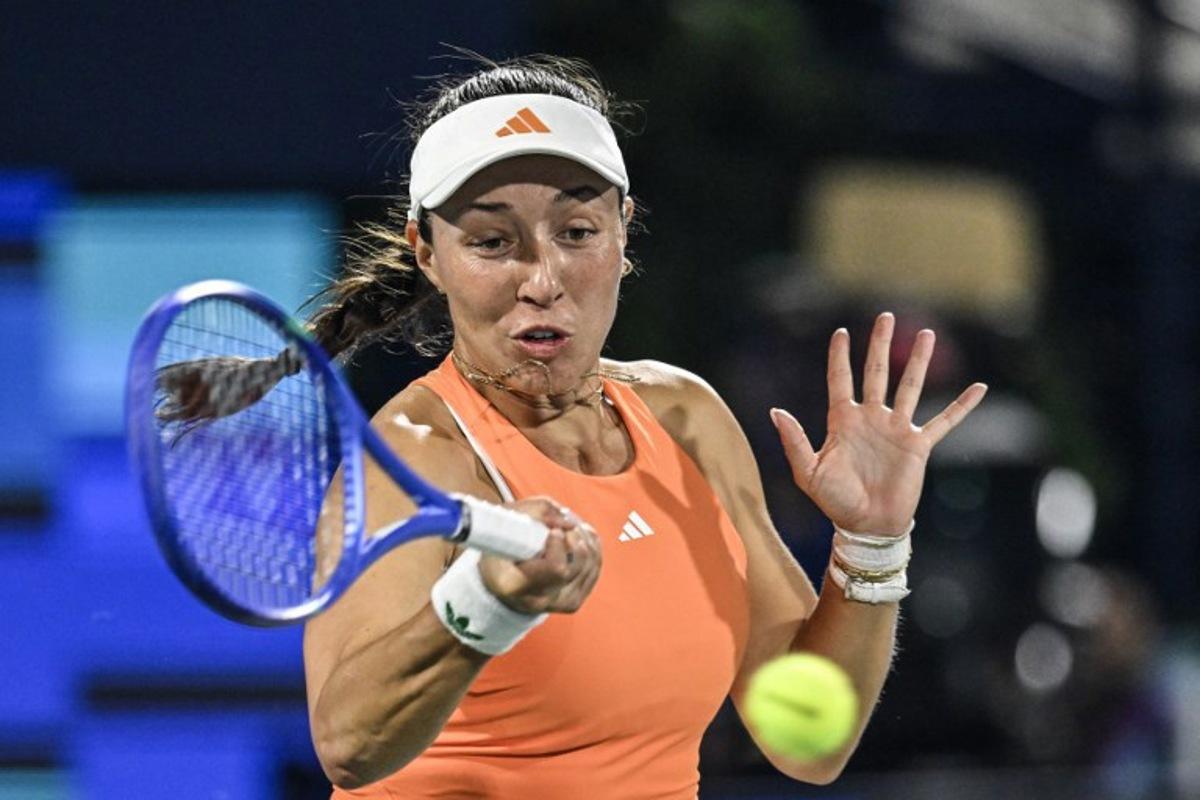 US' Jessica Pegula hits a return to Ukraine's Elina Svitolina during their women's singles final match at the Dubai Duty Free Tennis tournament in Dubai on February 21, 2026. Ryan Lim / AFP