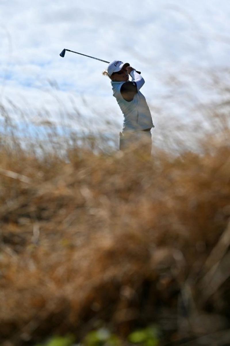 Belgium's Manon De Roey watches a drive from the 4th tee on the first day of the 2026 Women's British Open Golf Championships at Royal Lytham & St. Annes Golf Club, north-west England, on July 30, 2026. Glyn KIRK / AFP