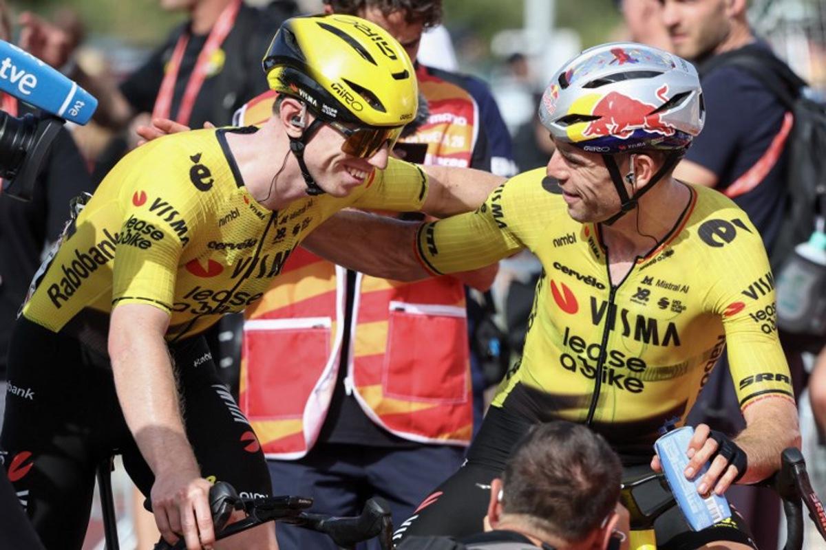 Team Visma-Lease a bike's British rider Matthew Brennan (L) is congratulated by teammate Team Visma-Lease a bike's French rider Christophe Laporte after winning the fifth stage of the Vuelta a Espana 2026, a 173,4 km race between Falset and Roquetes on August 26, 2026. Josep LAGO / AFP