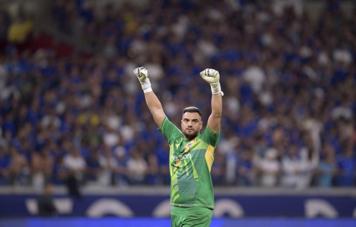 Boca Juniors' goalkeeper Sergio Romero celebrates a goal scored by teammate forward Milton Gimenez during the Copa Sudamericana round of 16 second leg football match between Brazil's Cruzeiro and Argentina's Boca Juniors at the Mineirao stadium in Belo Horizonte, Brazil, on August 22, 2024. DOUGLAS MAGNO / AFP