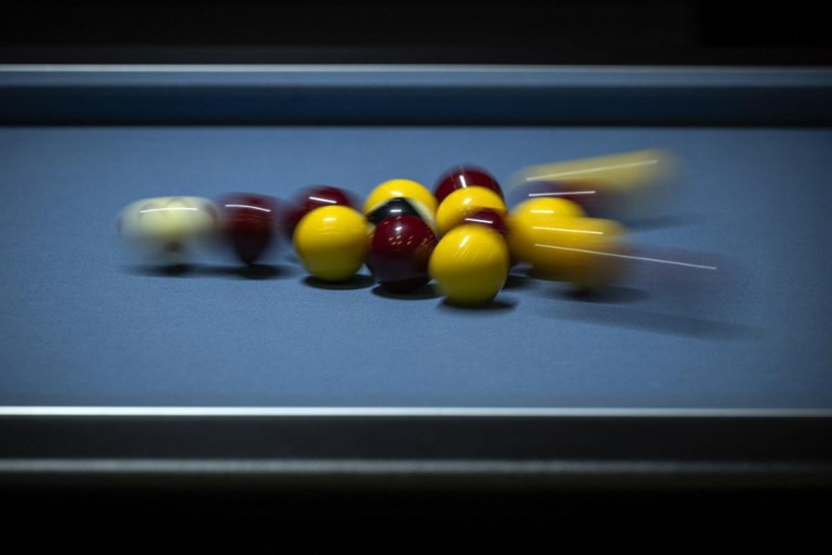 This photograph shows billiards' balls during the world blackball championships in Albi, southwestern France, on October 13, 2022. The world blackball championships take place in Albi from October 8 to 15, 2022. Lionel BONAVENTURE / AFP