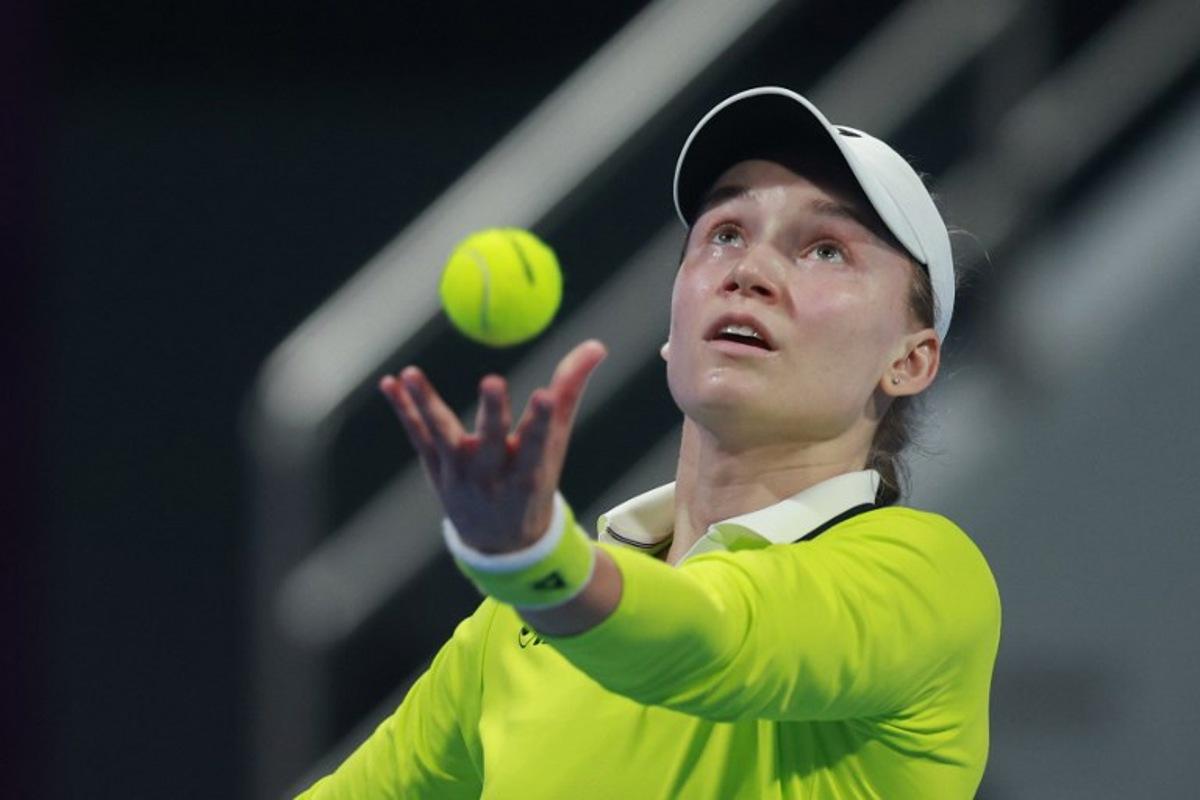 Kazakhstan's Elena Rybakina serves the ball against Canada's Victoria Mboko during their women's singles quarter-final match at the Qatar Open tennis tournament in Doha on February 12, 2026. Karim JAAFAR / AFP