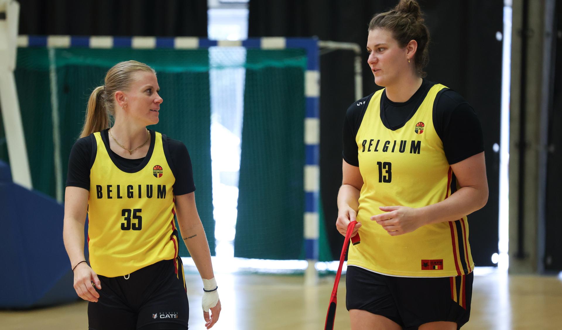 Belgium's Julie Vanloo and Belgium's Kyara Linskens pictured during a training session of the Belgian Cats during a press visit to the Team Belgium Base Camp in Kortrijk, Wednesday 24 July 2024. The Belgian Cats are preparing for the 2024 Olympics in Paris. The 2024 Summer Olympics take place in Paris from 26 July to 11 August. The Belgian delegation counts 165 athletes in 21 sports. BELGA PHOTO VIRGINIE LEFOUR