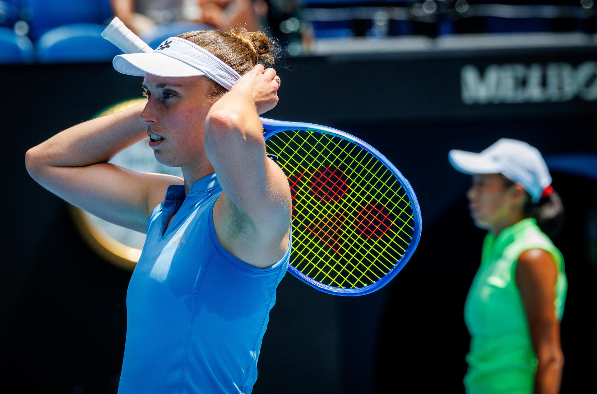 Belgian Elise Mertens (blue) and Chinese Shuai Zhang (yellow) pictured during a doubles tennis match between Belgian-Chinese pair Mertens-Zhang and Kazakh/Serbian pair Danilina/Krunic, in the final of the women doubles at the Australian Open, Melbourne Park, Melbourne on Saturday 31 January 2026. BELGA PHOTO PATRICK HAMILTON --- BENELUX ONLY ---