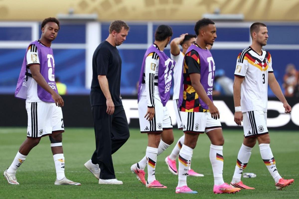 Germany's head coach Julian Nagelsmann (2nd L) reacts after losing the penalty shootout during the 2026 World Cup round of 32 football match between Germany and Paraguay at the Boston Stadium in Foxborough on June 29, 2026. FRANCK FIFE / AFP